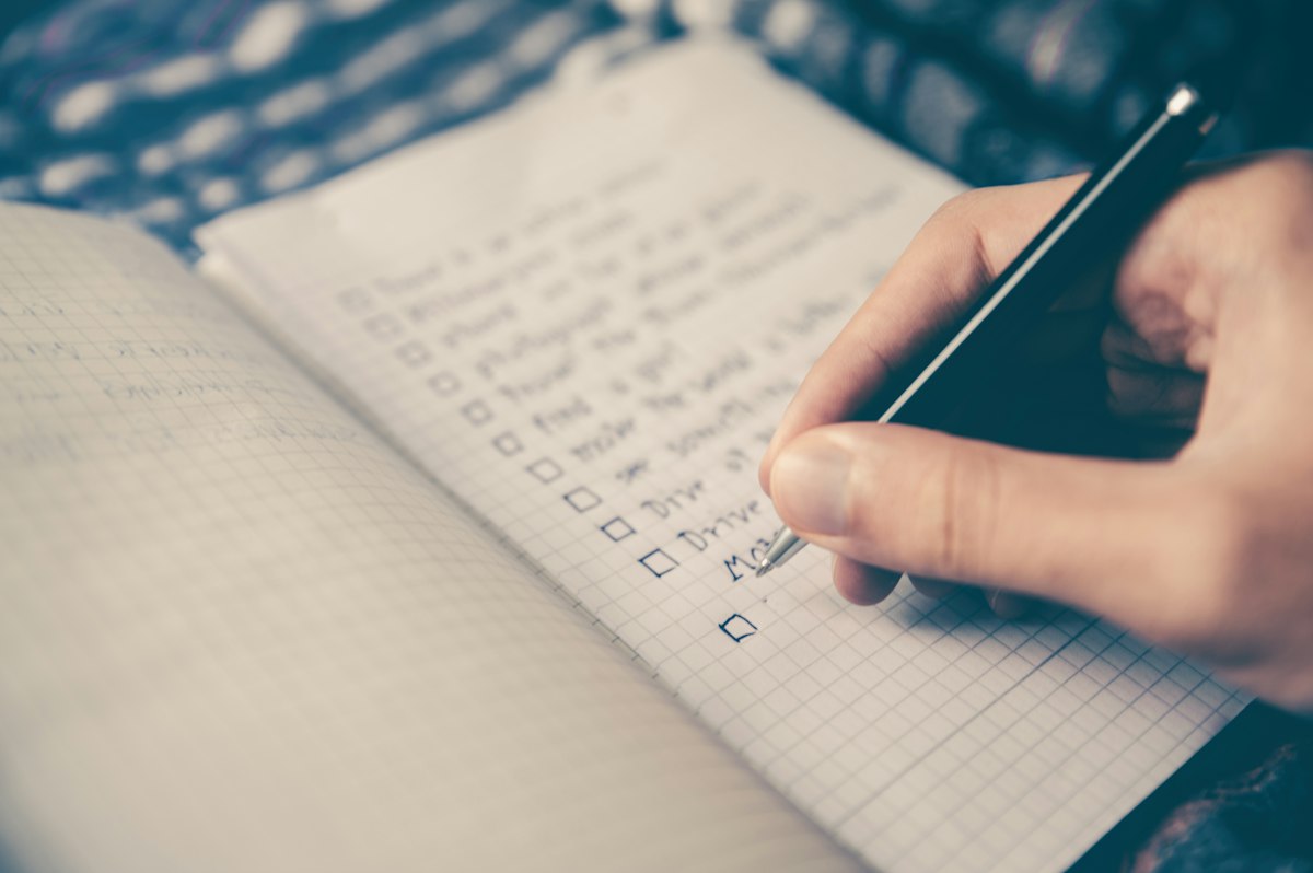 Open planner with handwritten milestone notes